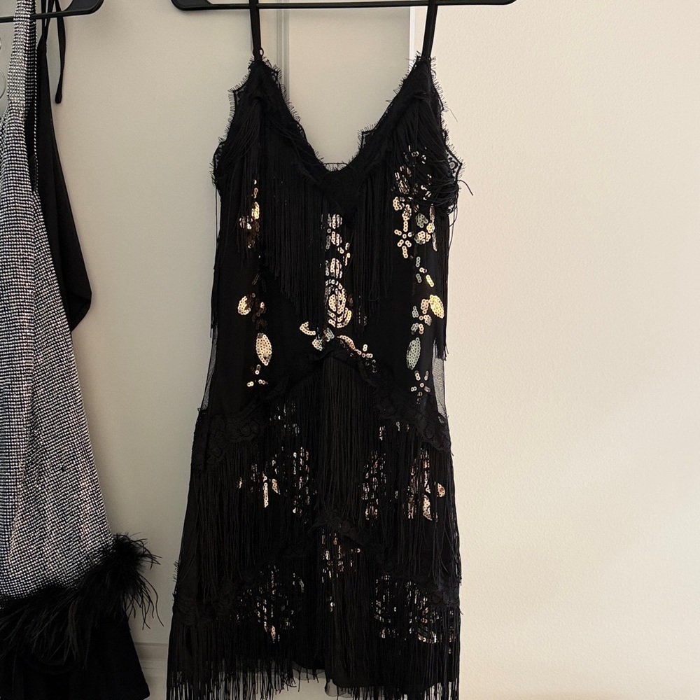Chic Black Dress with Fringe and Sequins